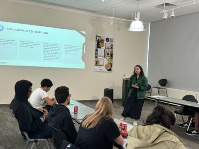 Zoe, one of our Product Managers, reviewing student feedback during the Dashboard prototype discussion.