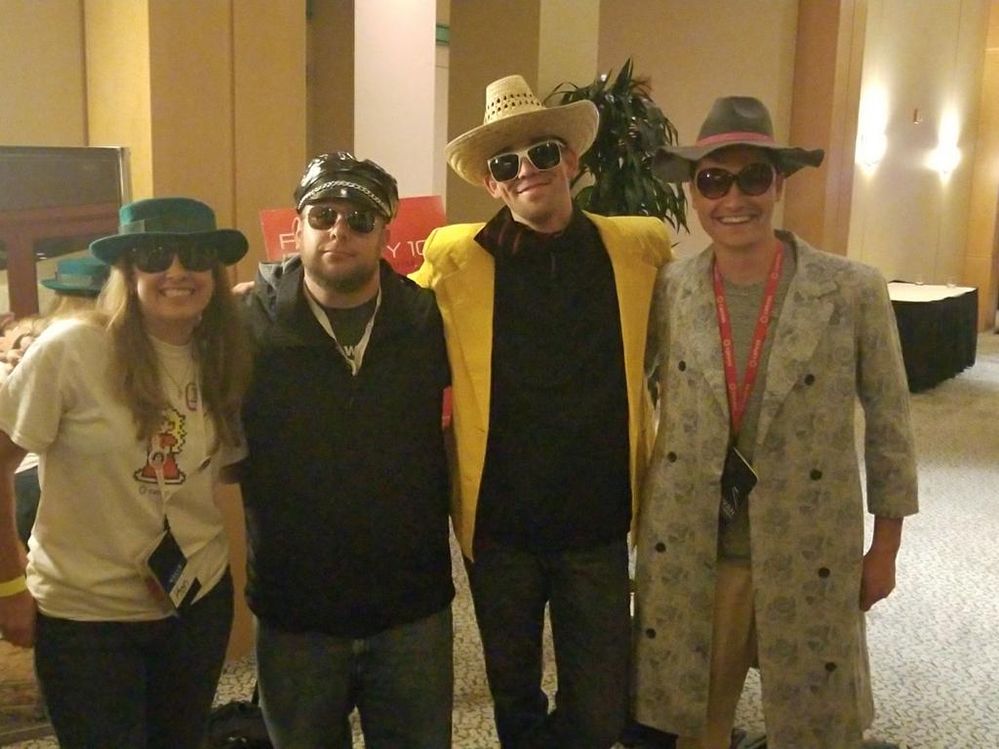 4 people dressed up 4 people dressed up