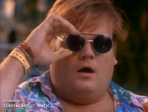 Chris Farley getting a better look by raising his sunglasses.